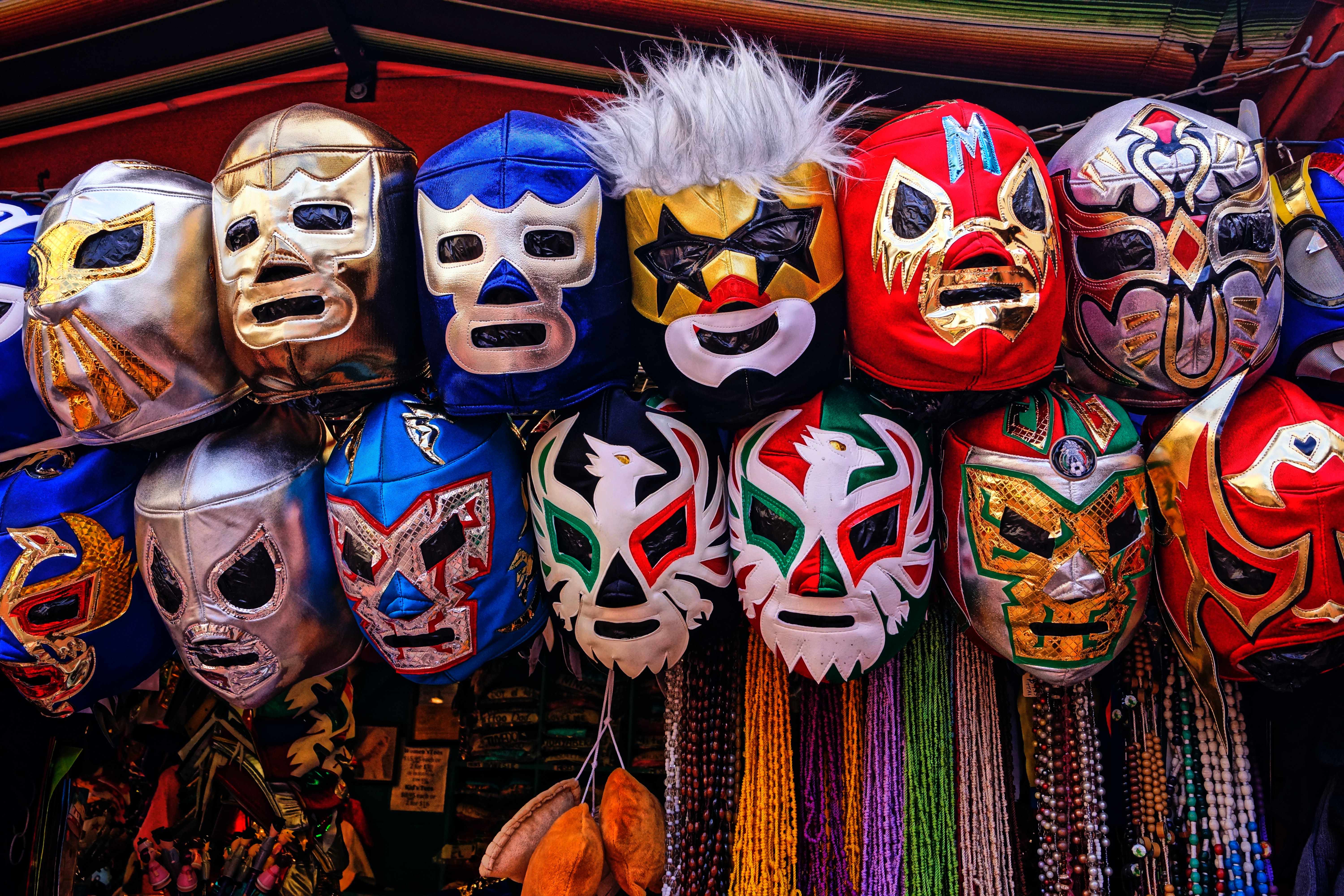 A collection of masks of luchadores