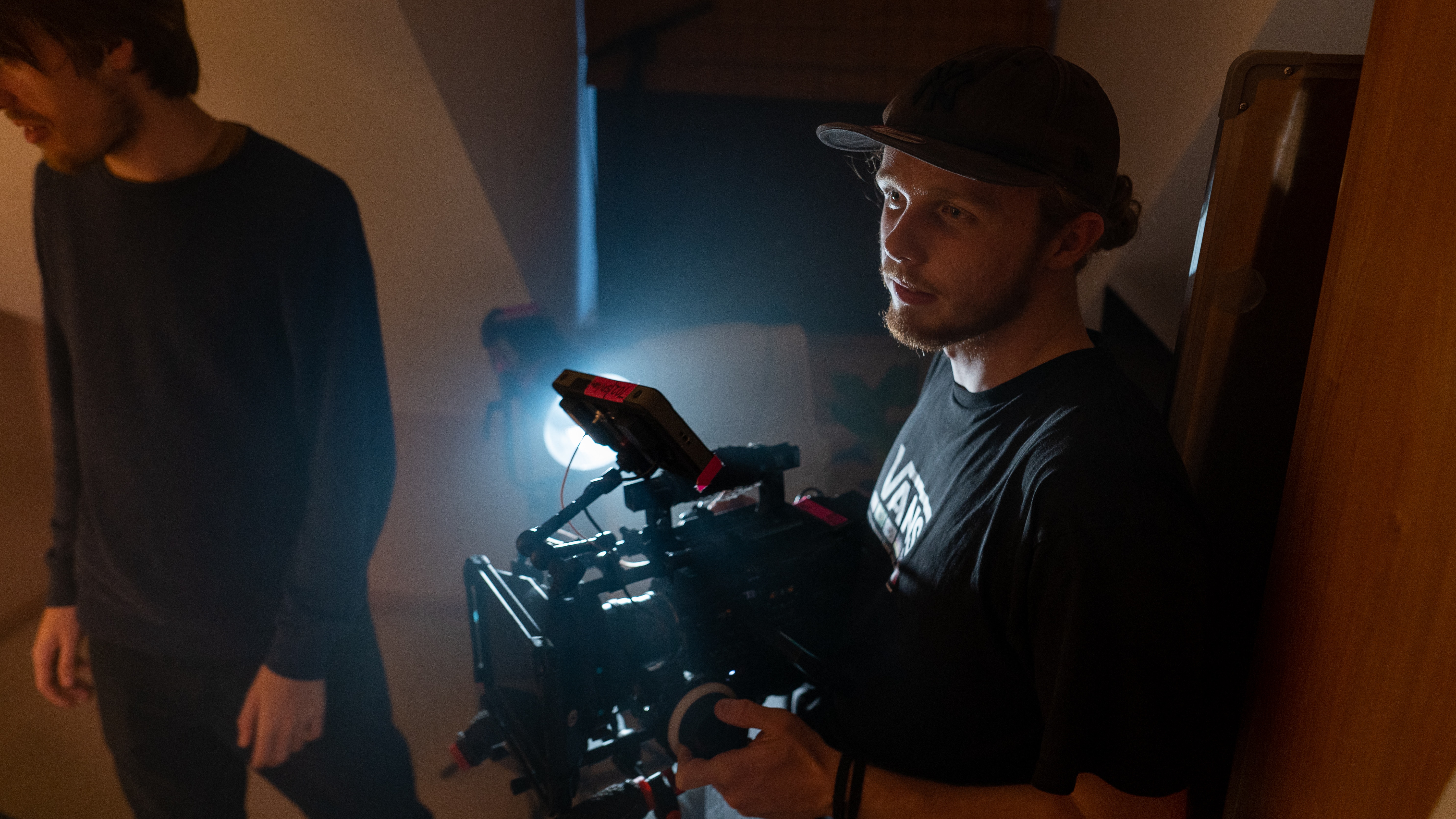 A director holding a camera