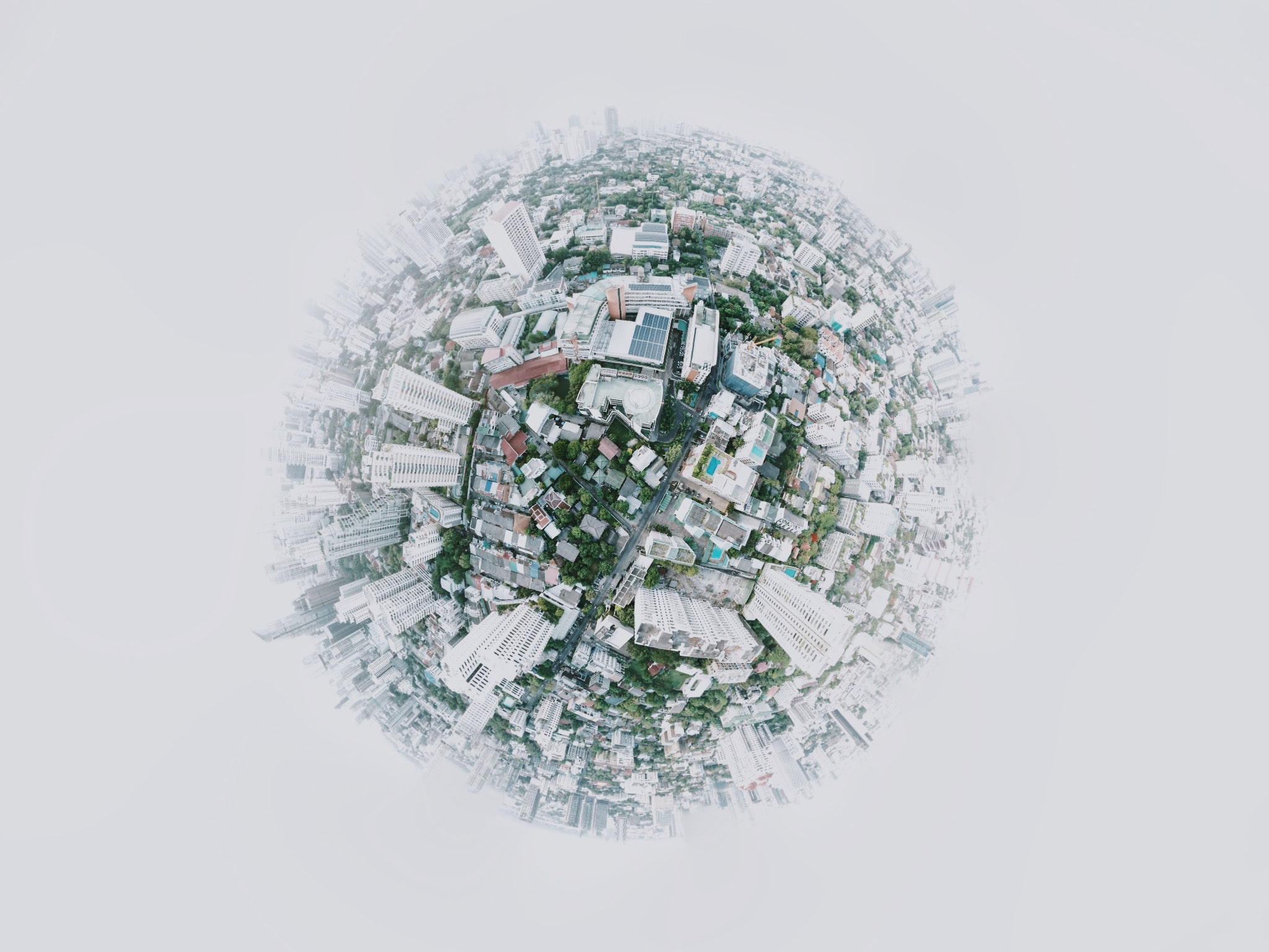 A top-down perspective of a city contained within a sphere