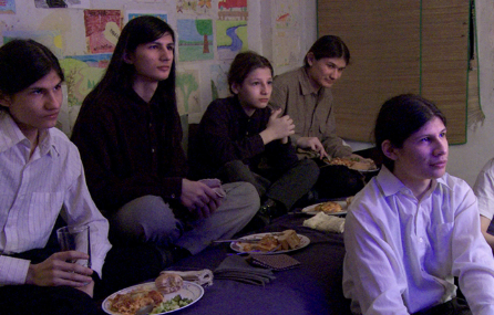 five boys watching a movie