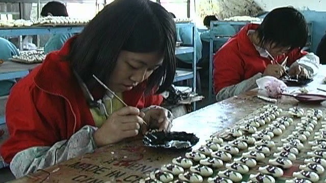 a young woman works crafts