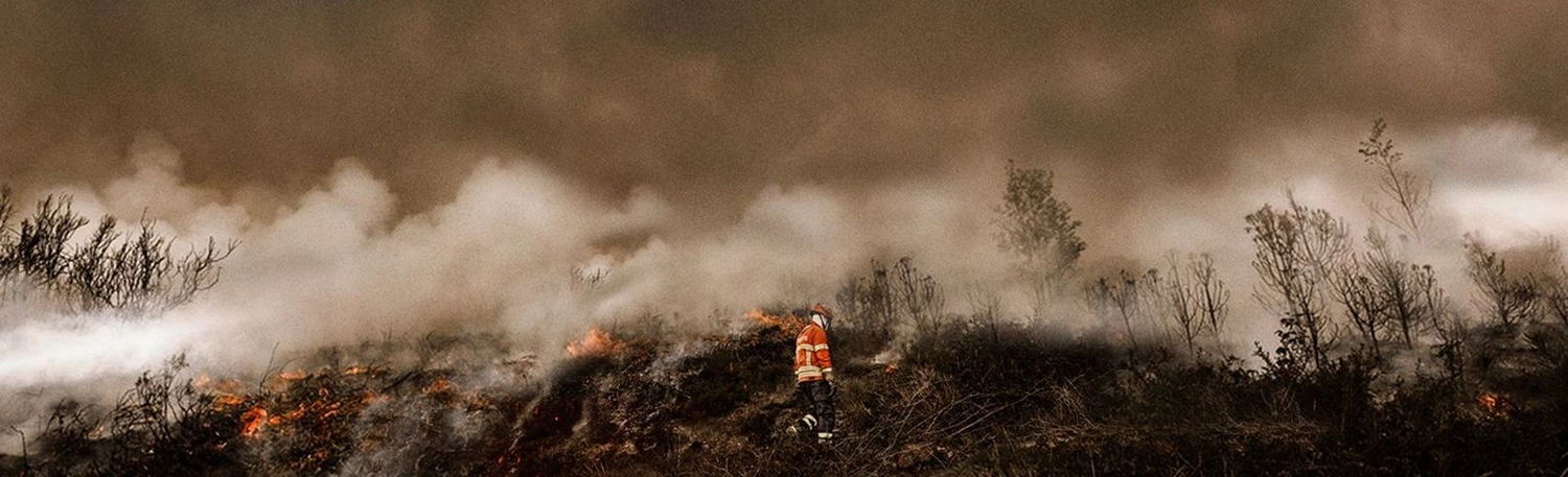 a firefighter putting out the fire