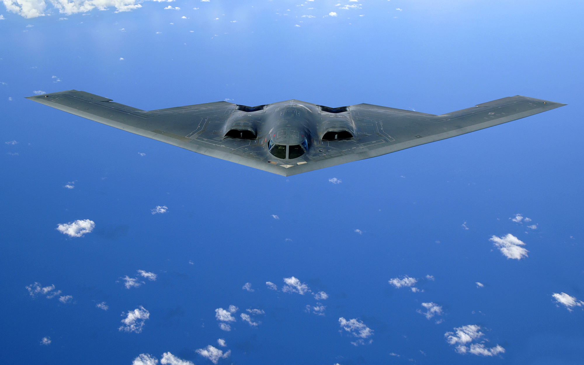 a B2 plane over the blue ocean