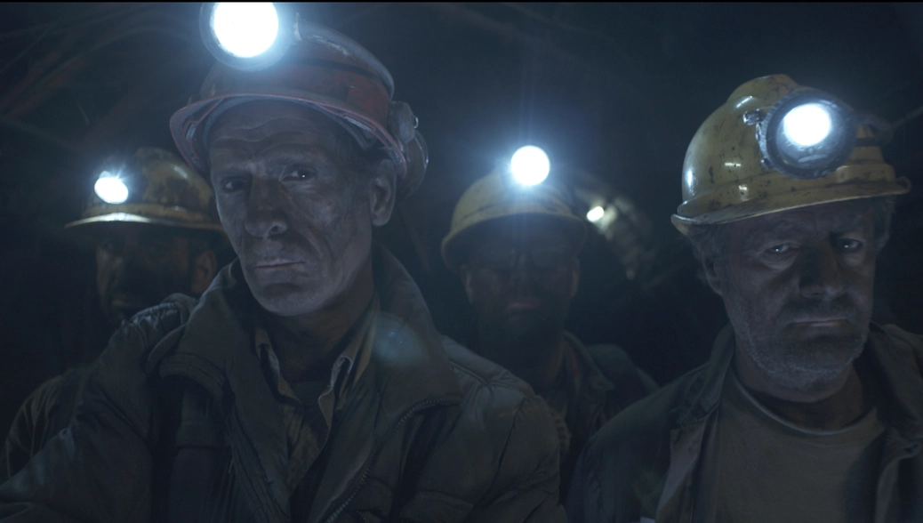 miners with helmets and internal