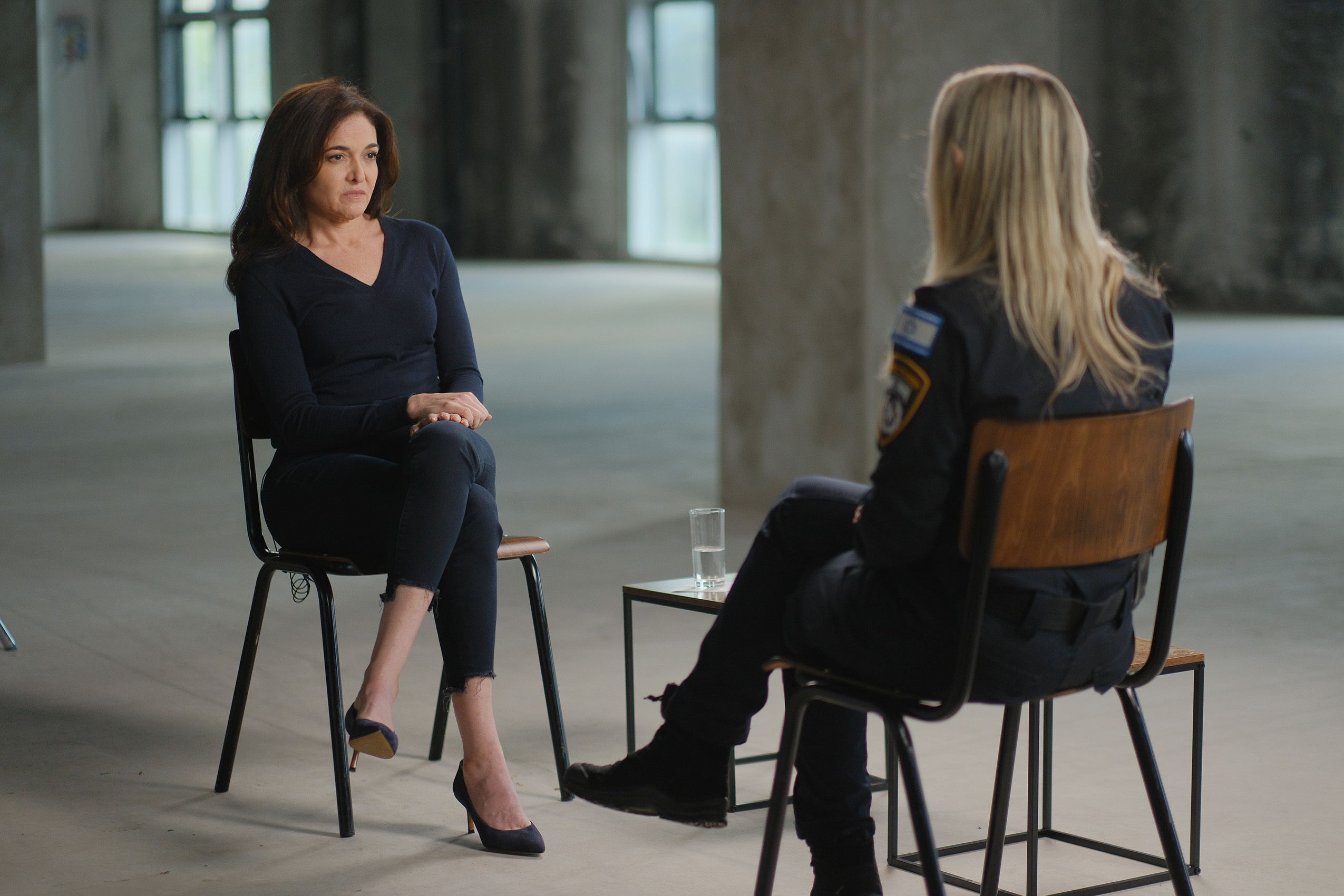 two women confront each other on an interview